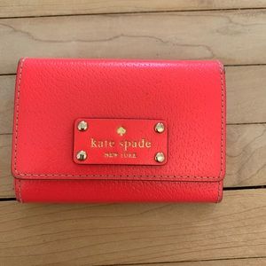 Neon coral Kate spade card wallet